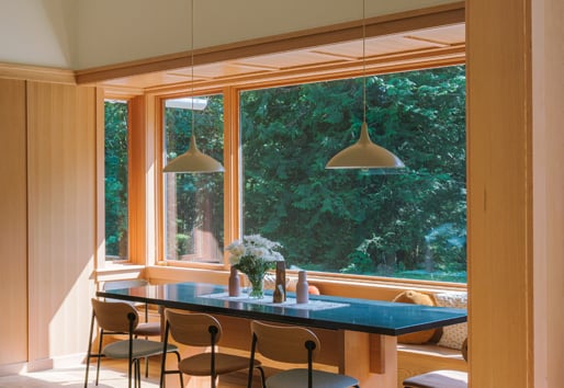 Cozy breakfast nook with E-Series Casement and Picture windows