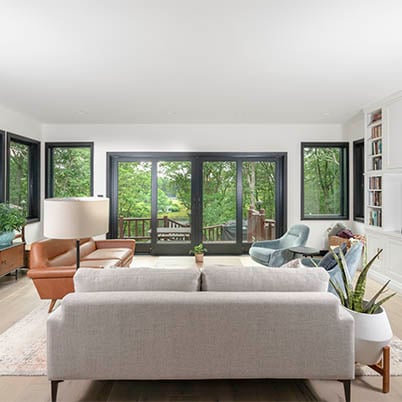 Upstate New York Modern Log Cabin Evan and Zosia Living Room A-Series Gliding Patio Door