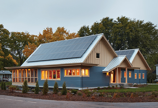 Net Zero Home and Living, House Exterior at Dusk with Solar Panels on Roof