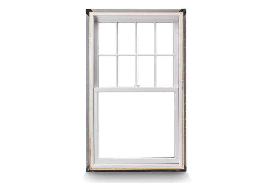 A flanged full-frame Andersen A-Series Double-Hung Window with modified colonial grilles in the top sash.