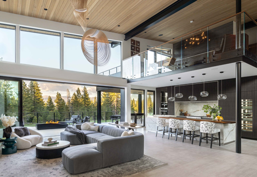 Modern living space with large big doors and stunning bar set up