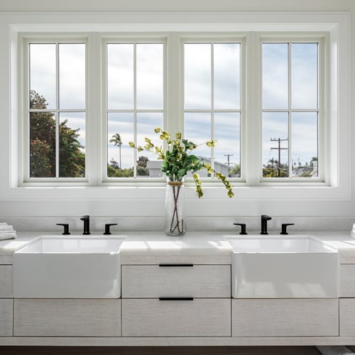 Stunning white bathroom with 4 large windows